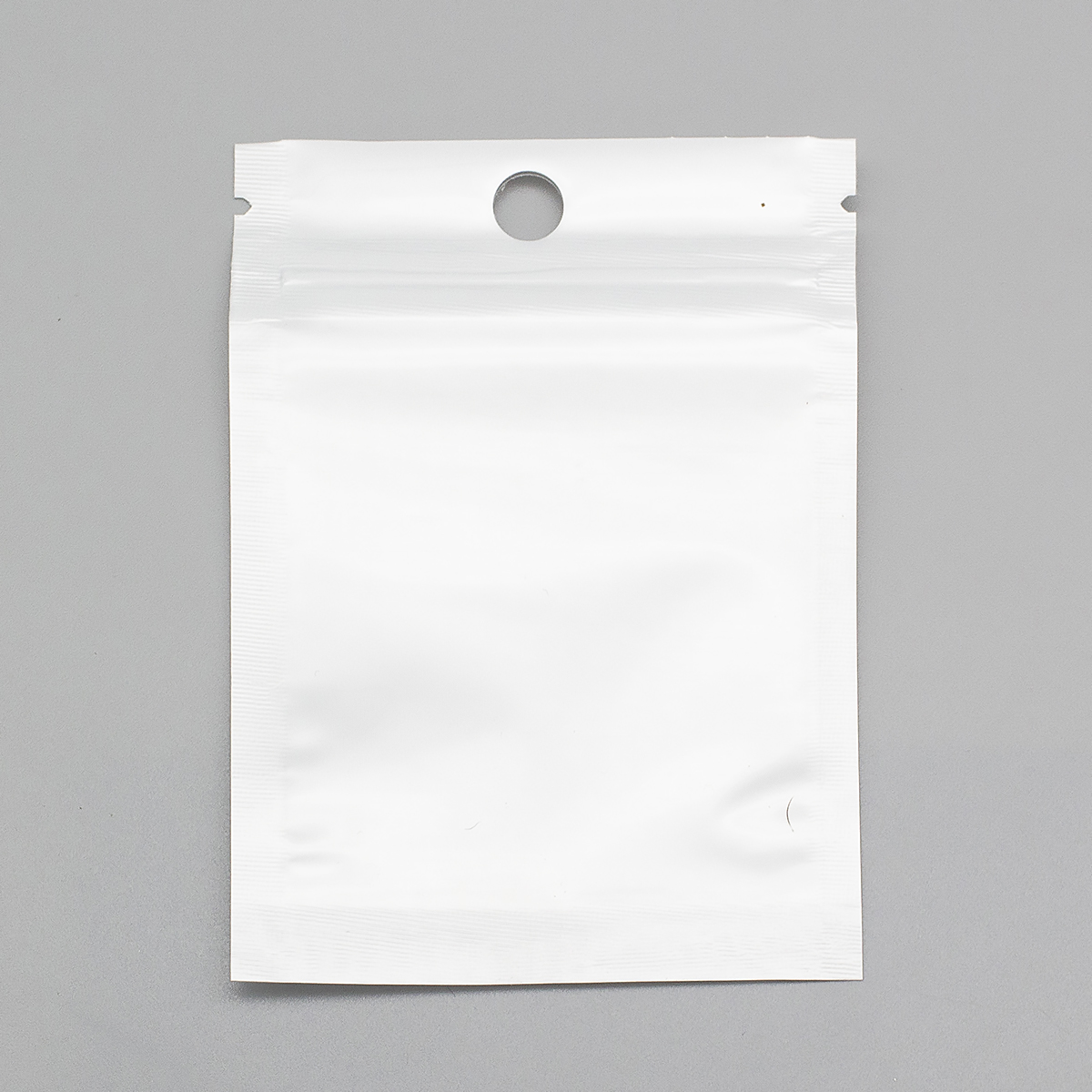 ЗИП Пакет Белый/Прозрачный, с подвесом, замок ZIP Lock, Размер: 10х7см, Внутренний размер: 7x6см, (УТ100011622)